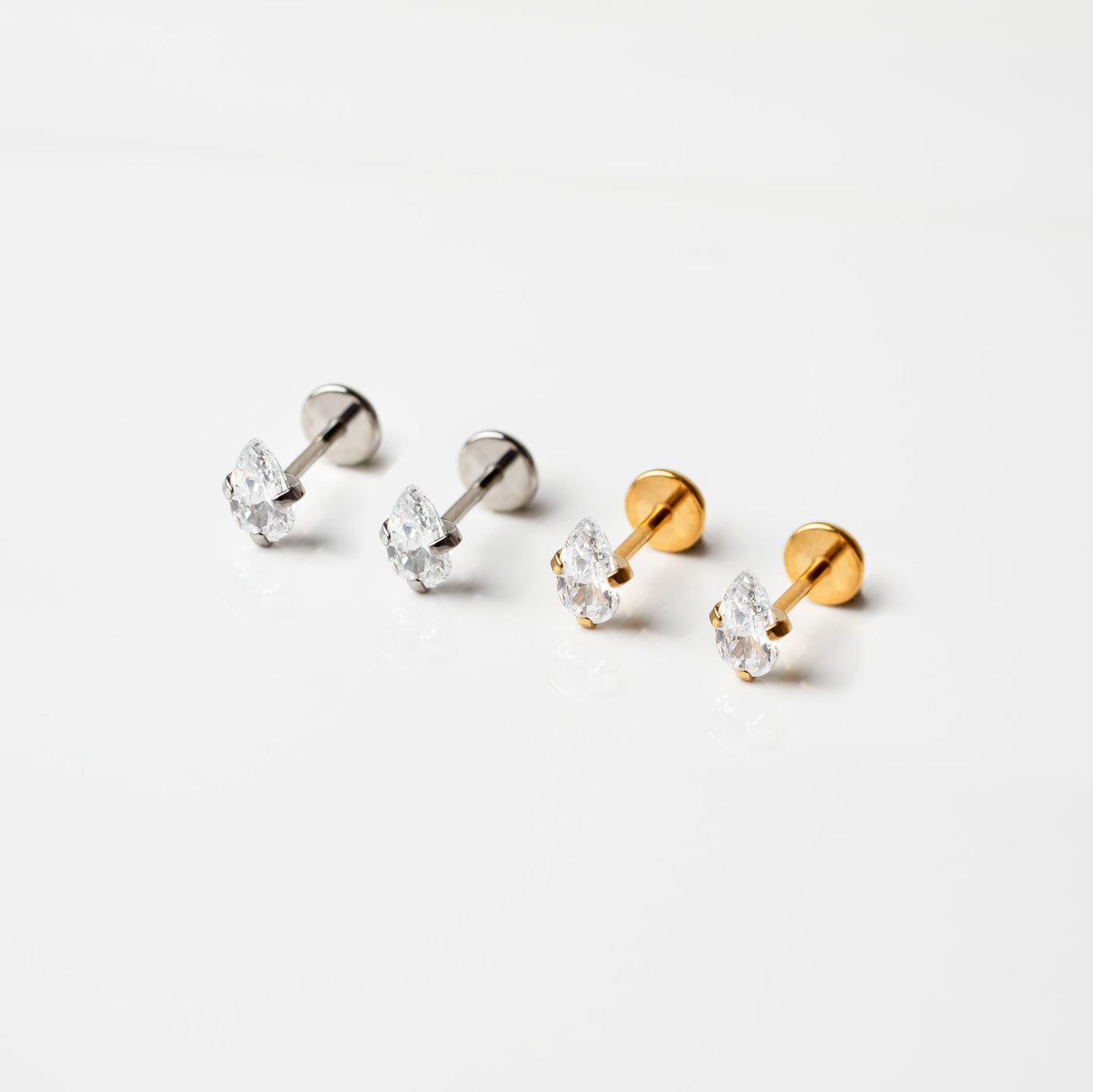 Ayn Prong Set Teardrop Flat Back Sleeper Earrings in Gold and Silver options