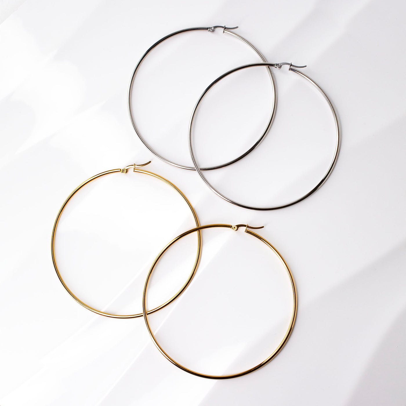Prism High Shine Giant Hoop Earrings - Proceeds Donated