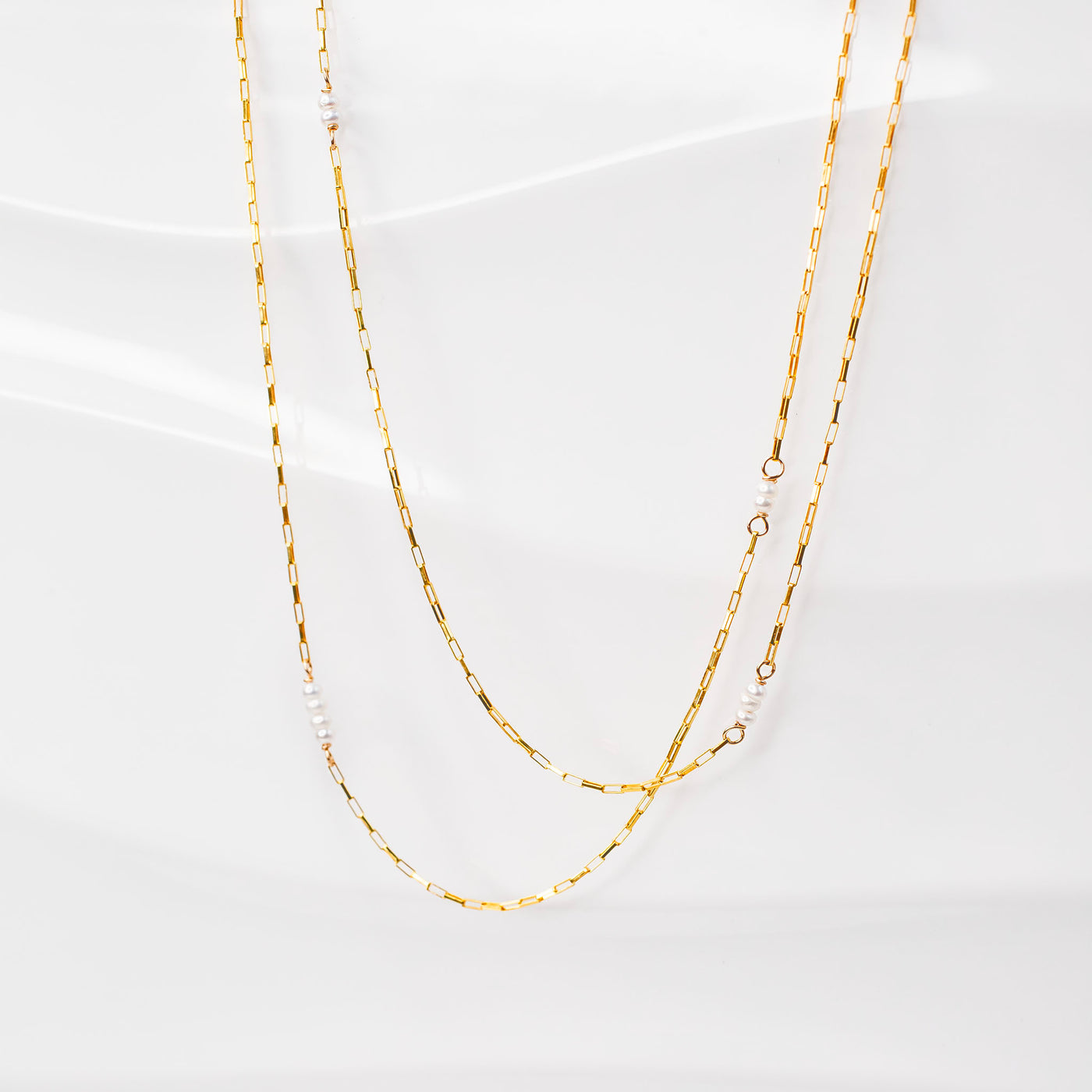 The Pura Freshwater Pearl Necklace + Huggie Earring Set