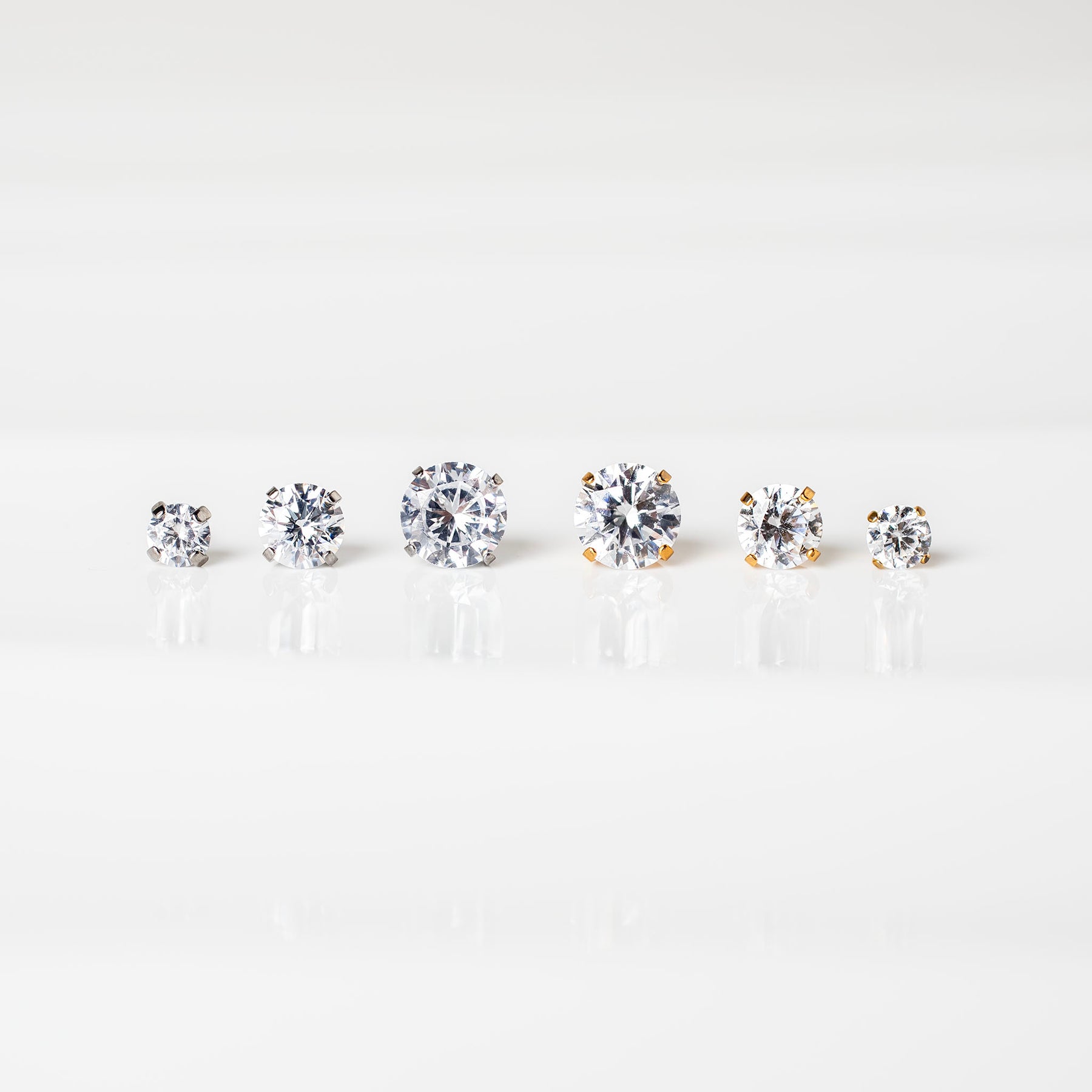 Titanium Ear Stack The Signature Stack Titanium Solitaire Flat Back Sleeper Earrings Set ...