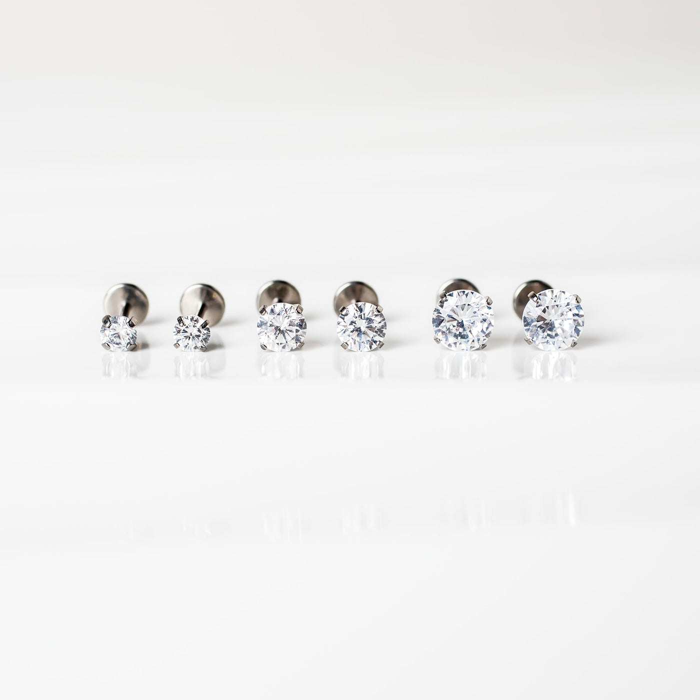 The Signature Stack Titanium Solitaire Flat Back Sleeper Earrings Set