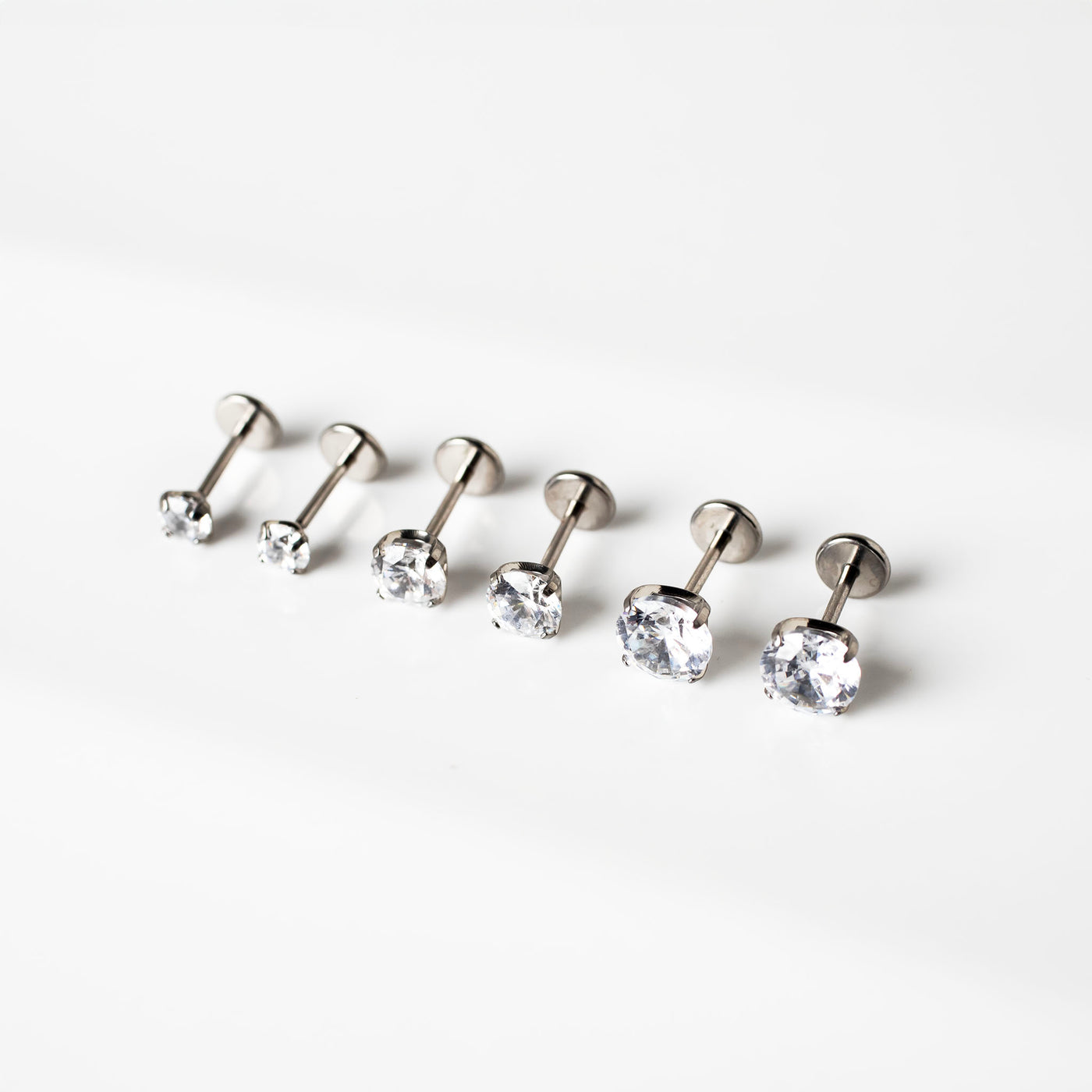 The Signature Stack Titanium Solitaire Flat Back Sleeper Earrings Set