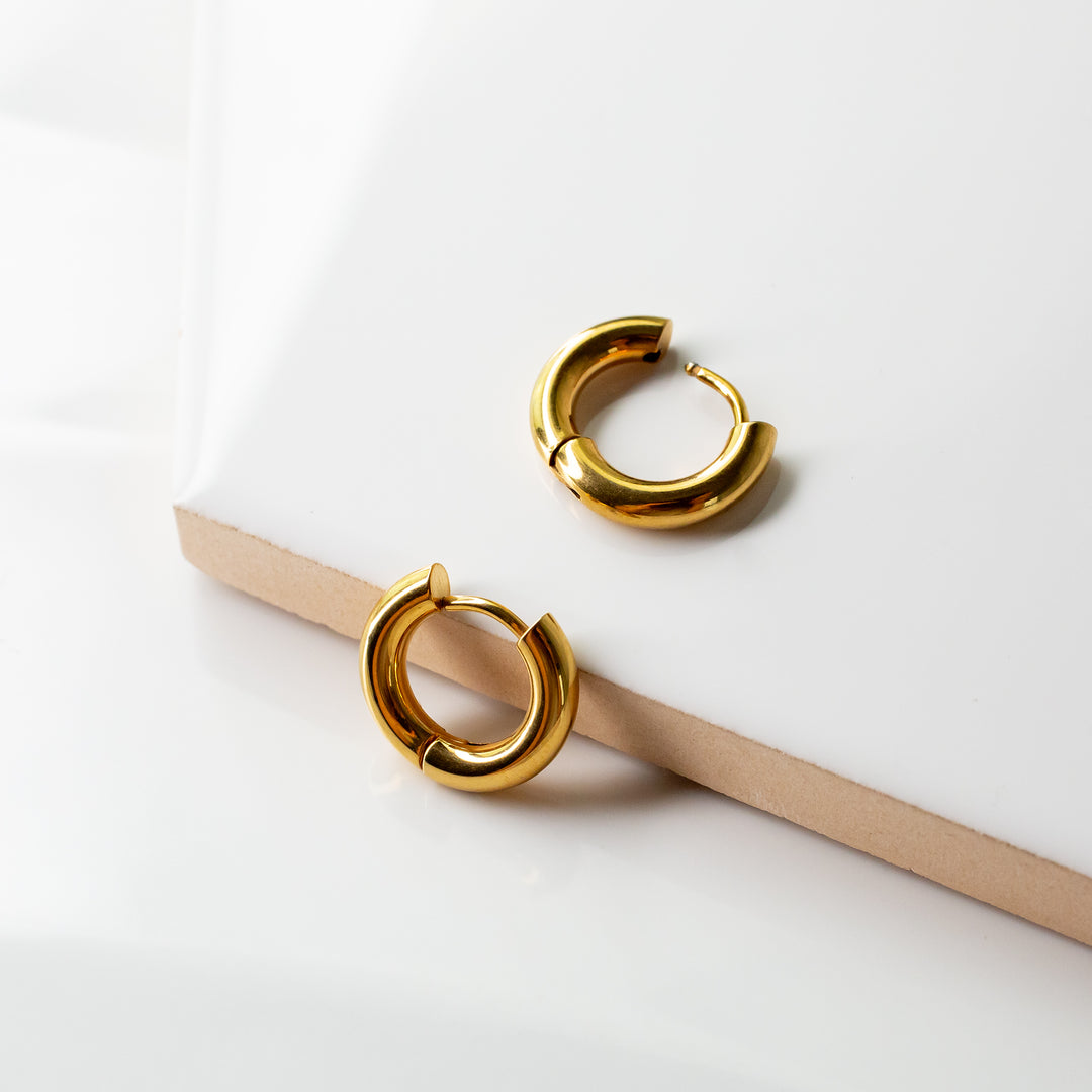 Dainty gold huggie earrings online